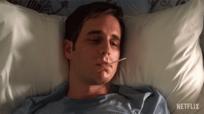 Man Lying In Bed With Thermometer Netflix GIF