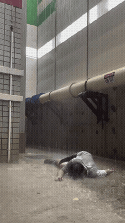 Man Lying In Flood, Danger Do Not Enter GIF