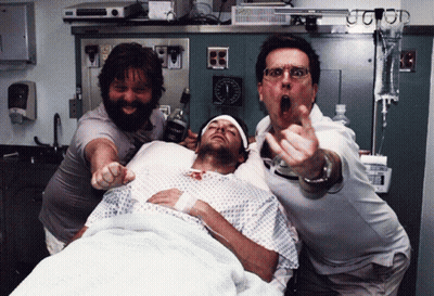 Man Lying In Hospital Bed Holding Tequila GIF