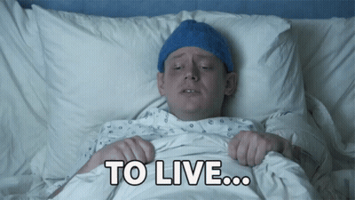Man Lying In Hospital Bed Saying To Live GIF
