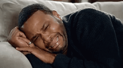 Man Lying On Couch Crying GIF