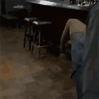 Man Lying On Floor In Room GIF