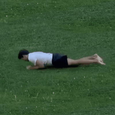 Man Lying On Grass GIF