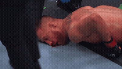 Man Lying On Ground Bleeding From Mouth GIF