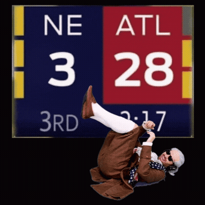 Man Lying On Ground By Scoreboard Ne Atl GIF