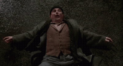 Man Lying On Ground Surprised Arms Outstretched GIF