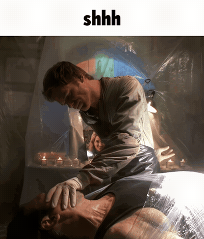 Man Lying On Table Shhh GIF