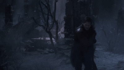 Man Making Face In Front Of Jurassic World Sign GIF