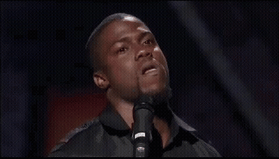 Man Making Funny Face At Microphone GIF