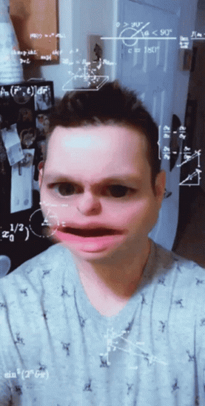 Man Making Funny Face Behind Math Equations GIF