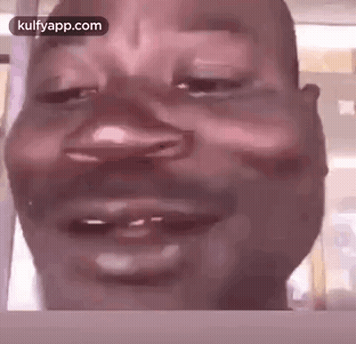 Man Making Funny Face Eyes Closed GIF