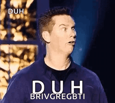 Man Making Funny Face In Blue Duh Shirt GIF