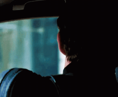 Man Making Funny Face In Car GIF