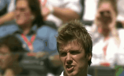 Man Making Funny Face in Front of Crowd