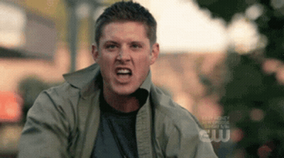 Man Making Funny Face In Front Of Easy Money Sign GIF