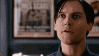Man Making Funny Face In Front Of Framed Picture GIF