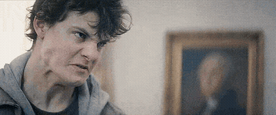 Man Making Funny Face In Front Of Picture GIF