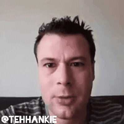 Man Making Funny Face On Couch GIF