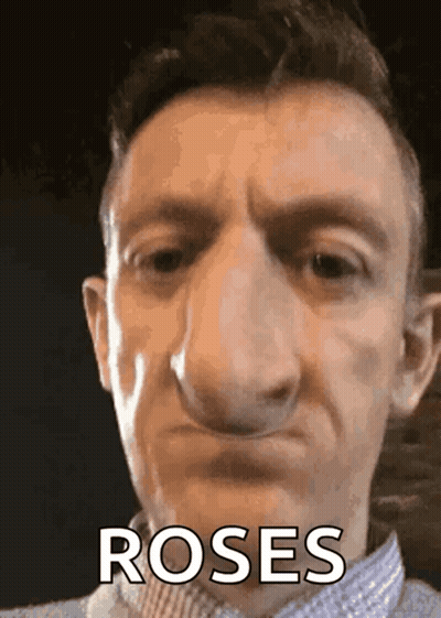 Man Making Funny Face Roses Are GIF