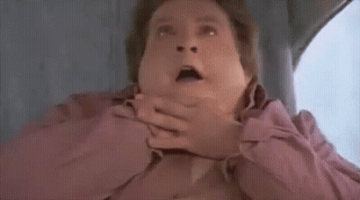 Man Making Funny Face Sitting In Chair GIF