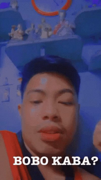 Man Making Funny Face With Bobo Kaba GIF