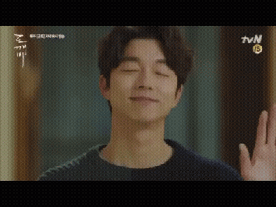 Man Making Funny Face With Eyes Closed And Hand Up GIF