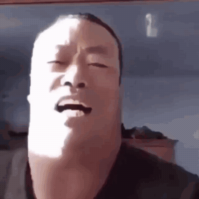 Man Making Funny Face With Eyes Closed In Sun GIF