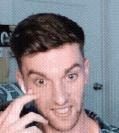 Man Making Funny Face With Finger On Nose GIF