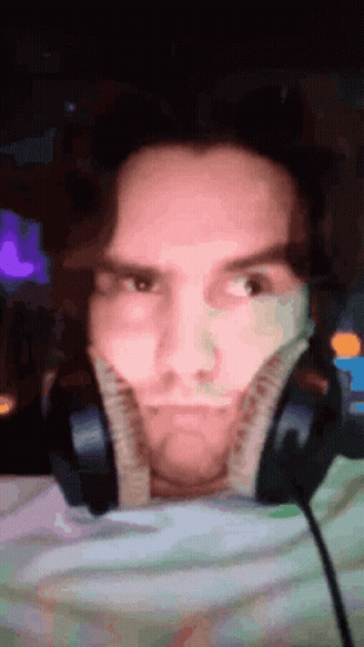 Man Making Funny Face With Headphones GIF
