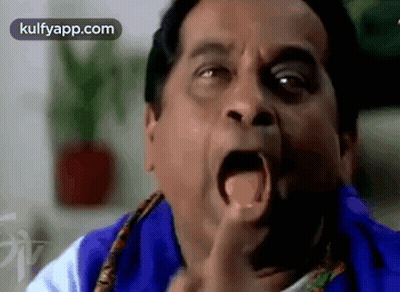Man Making Funny Face With Mouth Wide Open GIF