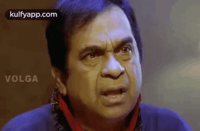 Man Making Funny Face With Scarf GIF