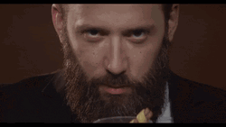 Man Making Glass Float With Pendulum GIF