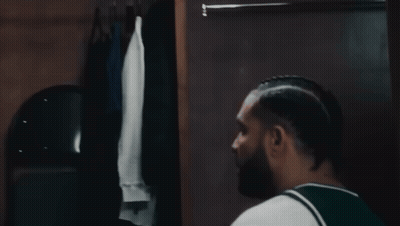 Man Making Heart Shape With Hands At Table GIF