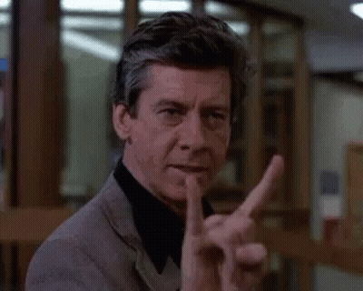 Man Making Peace Sign GIF
