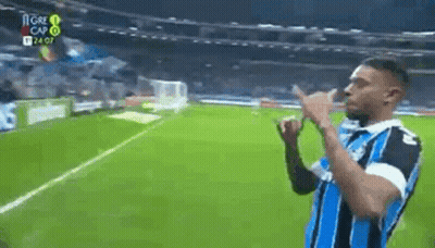 Man Making Peace Sign On Soccer Field GIF