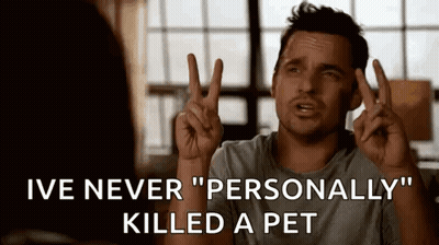 Man Making Peace Sign Talking To Another Man GIF