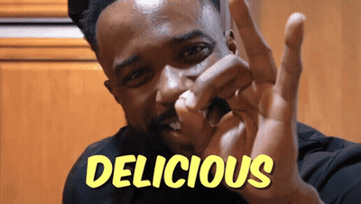 Man Making Peace Sign With Word Delicious GIF