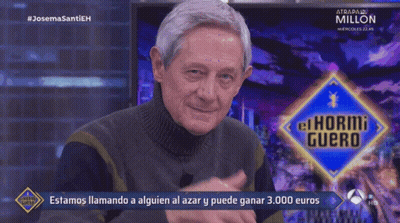 Man Making Phone Call With El Horno Guero Sign GIF