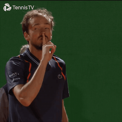 Man Making Shhh Gesture In Front Of Tennis TV Logo GIF