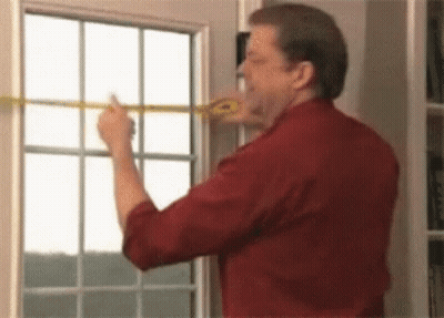 Man Measuring Window With Tape GIF