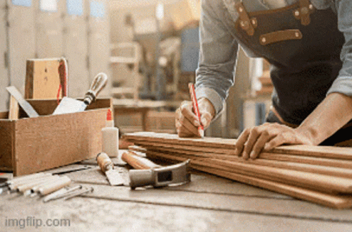 Man Measuring Wood With Red Pen GIF