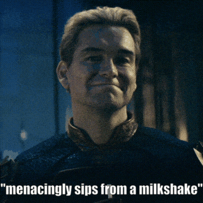 Man Menacingly Sips From A Milkshake GIF