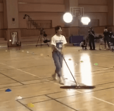 Man Mopping Basketball Court Floor GIF