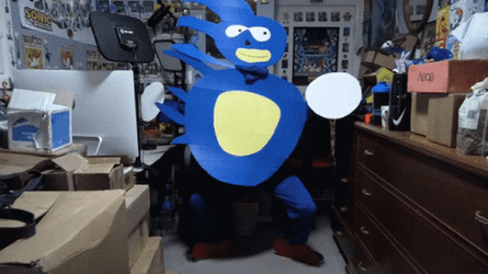 Man Moving A Funny Lifesize Sonic Cutout GIF