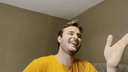 Man Moving Hand Laughing Then Crying GIF