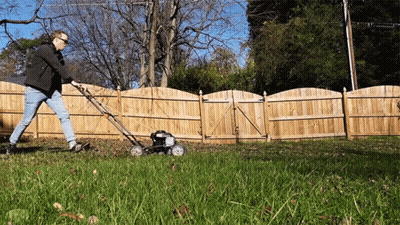 Man Mowing Lawn GIF