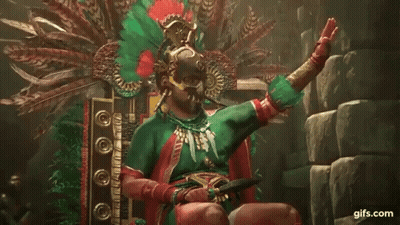 Man Native American Costume On Throne Holding Sword GIF