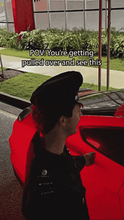 Man Next to Red Car POV You're Getting Pulled Over