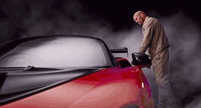 Man Next To Red Sports Car With Smoke GIF