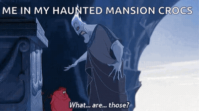 Man Next To Statue Saying Me In My Haunted Mansion Crocs GIF